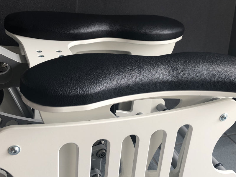 Joyrider Orgasm Machine by 1ATOYS: Black padded seats, extremely stable white metal frame. A machine for semi-automatic masturbation penetration with suitable dildo attachments.