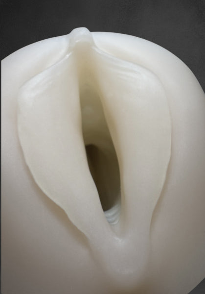 The real sailor's bride from 1ATOYS is a masturbator with a realistic vagina replica that offers a pleasurable experience through lifelike design. Close-up of labia and clitoris.