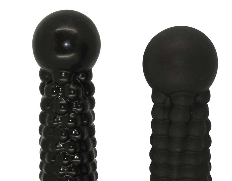 Cannonball dildo by 1ATOYS, two black "cannonballs" made of premium platinum silicone with a textured surface. Matte and glossy finish.