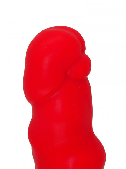 Red premium silicone sex toy with highly structured design, combining plug and dildo functionality for innovative pleasure. Close-up of the tip.