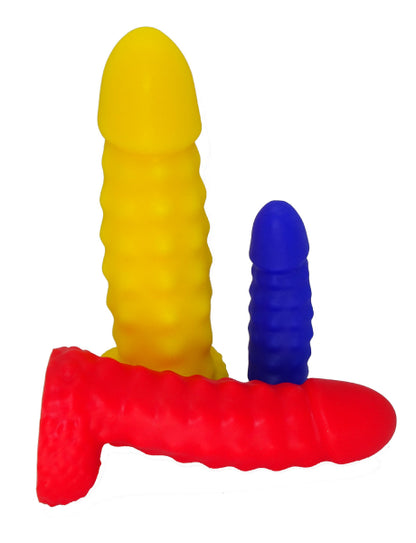 Dildos made of premium silicone with a ribbed shaft and rounded tip for gentle to intense stimulation from 1ATOYS. Masterpiece 4 Series. Available in five sizes and many colors.