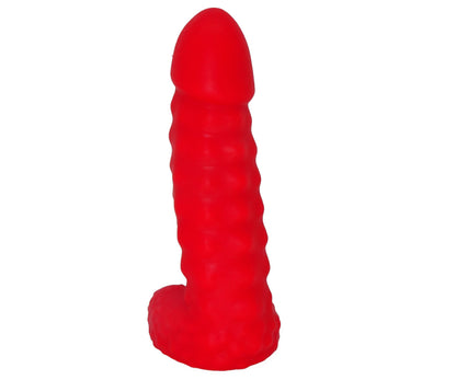 Premium silicone dildo with stimulation nubs on the shaft, rounded tip, and testicles at the base. Made by 1ATOYS. Masterpiece Series 4 for intense stimulation.
