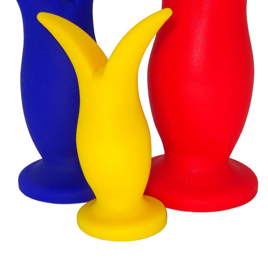 Analplugs aus Premium-Silikon in Blau, Gelb und Rot  für angenehme anale Stimulation.