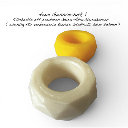 Cockring back detail view – two rings in mother-of-pearl and yellow.